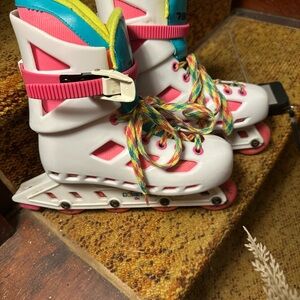 Colorful Rollerblades with Pink and White Design